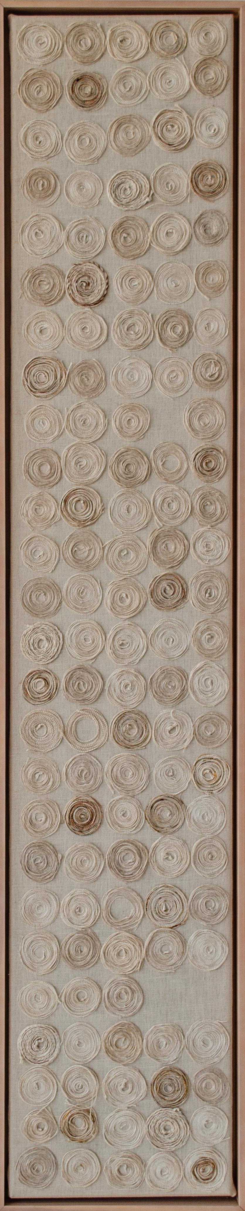 Alt text: collage of wound thread on canvas