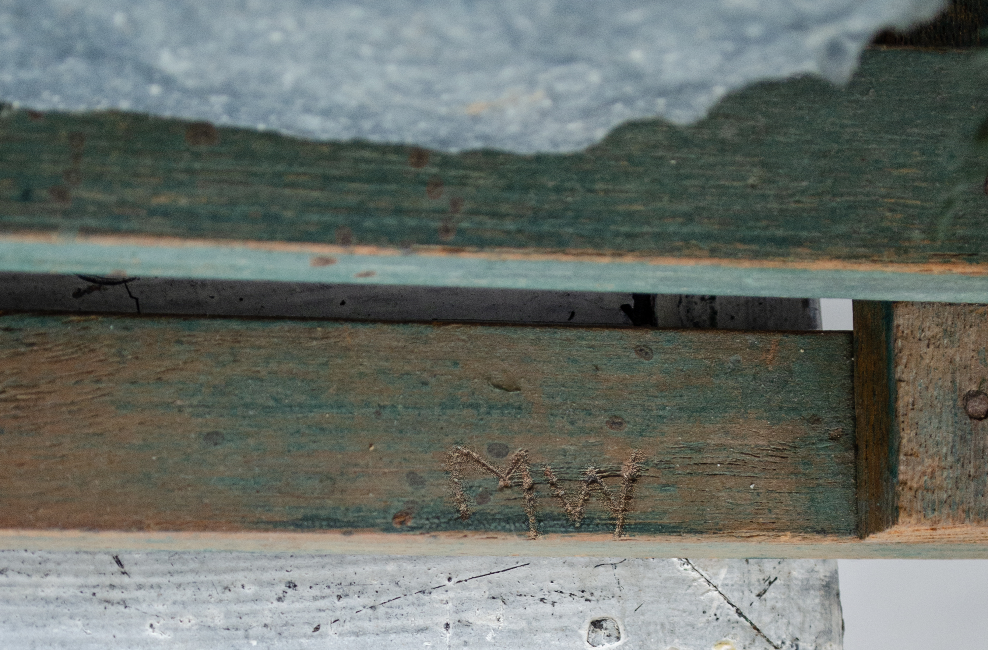 Alt text: signature detail of wood and flax paper sculpture construction