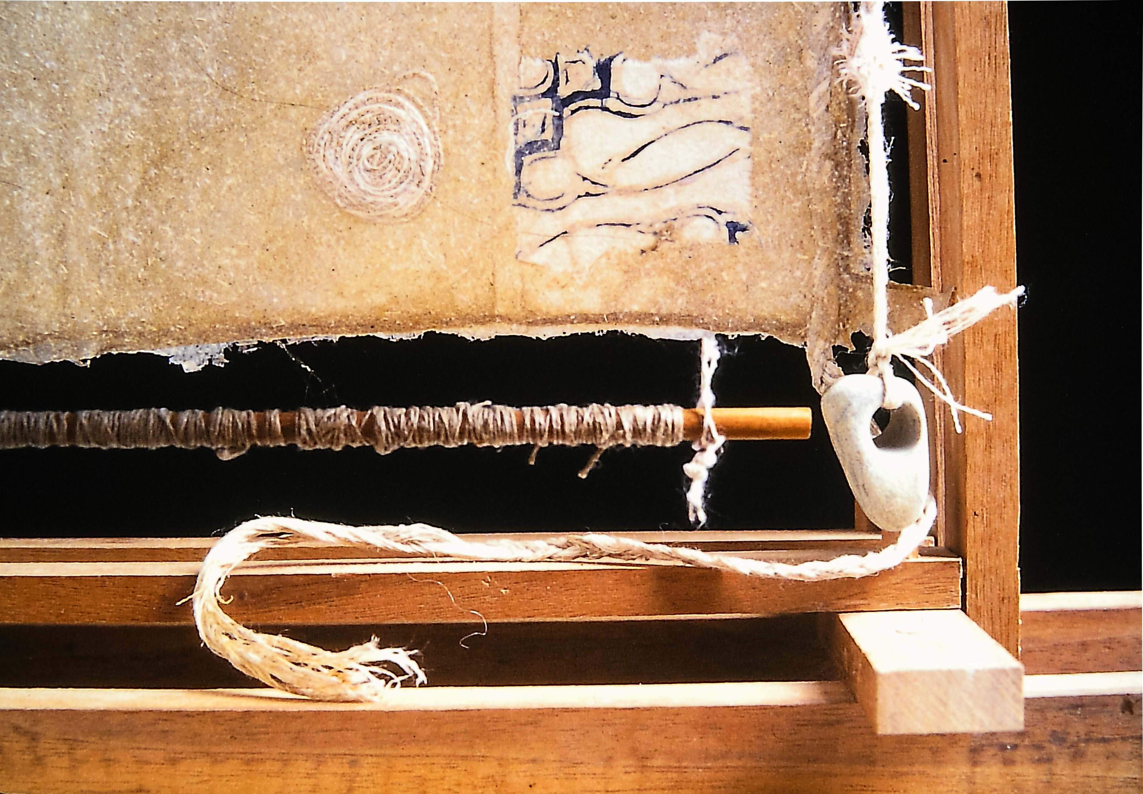 Alt text: detail of wood and flax paper sculpture construction