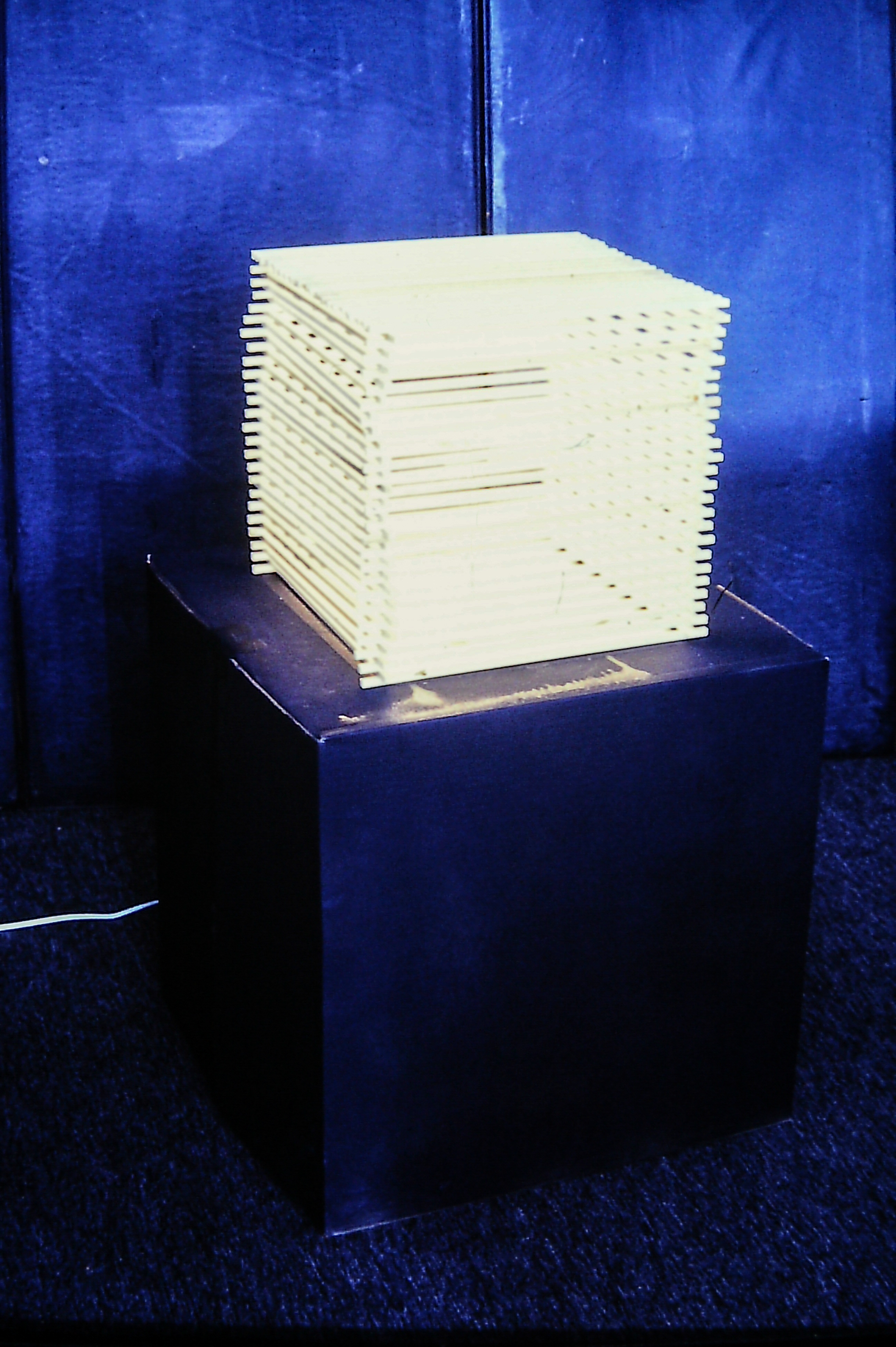 Alt text: light box construction of interlocking wooden slats