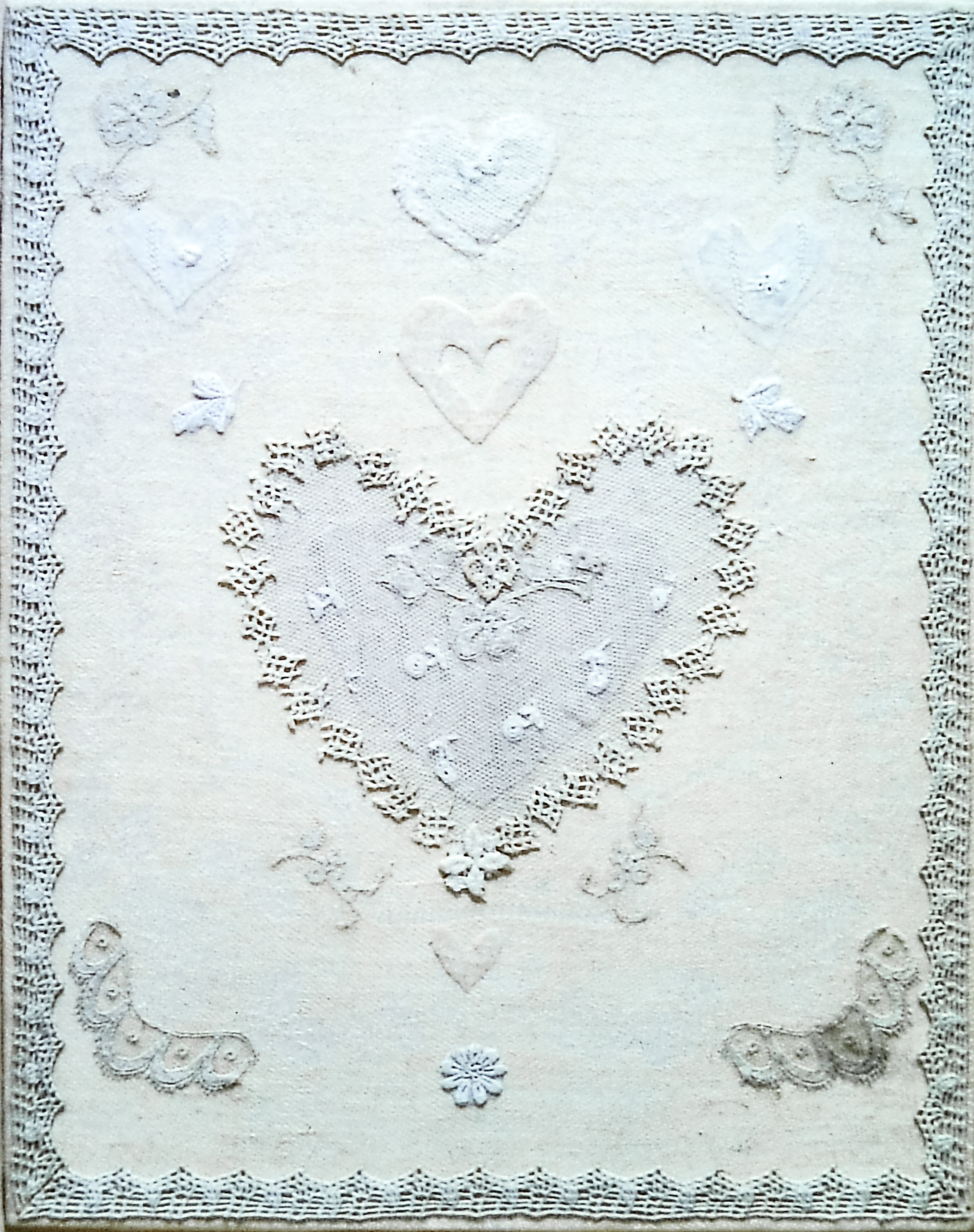 Alt text: Cloth collage with heart motifs