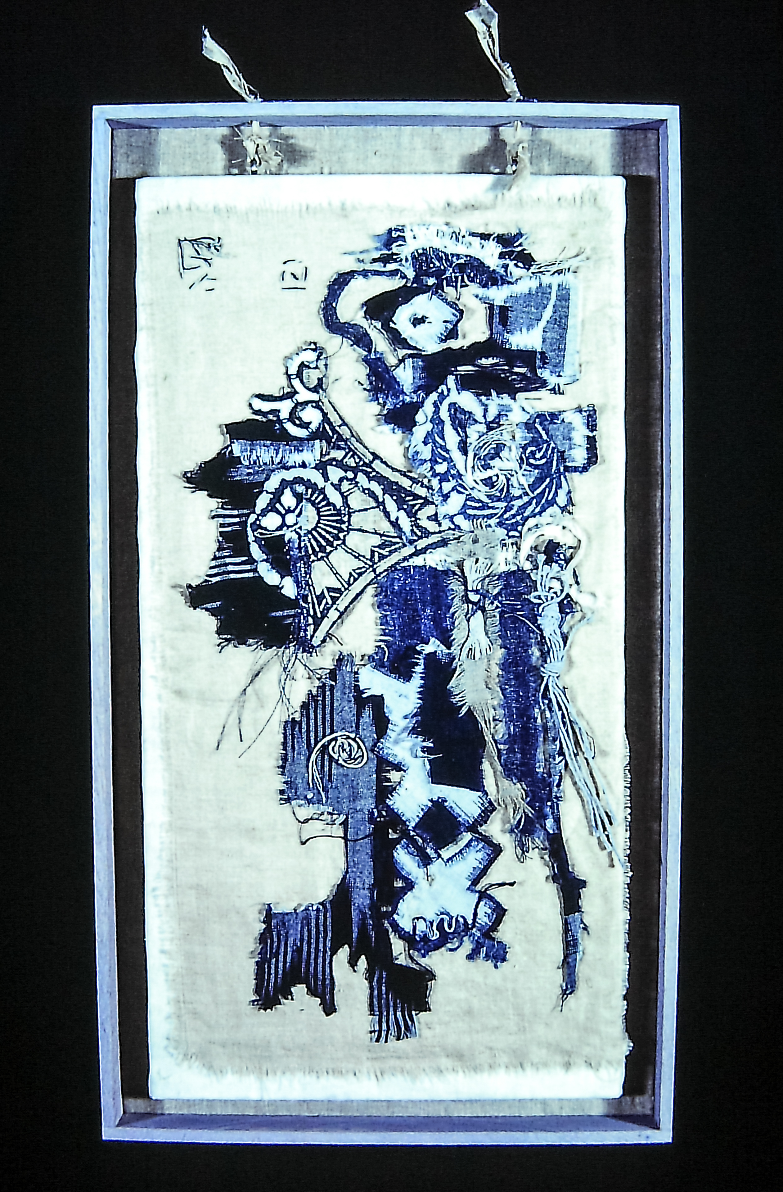 Alt text: Abstract cloth collage