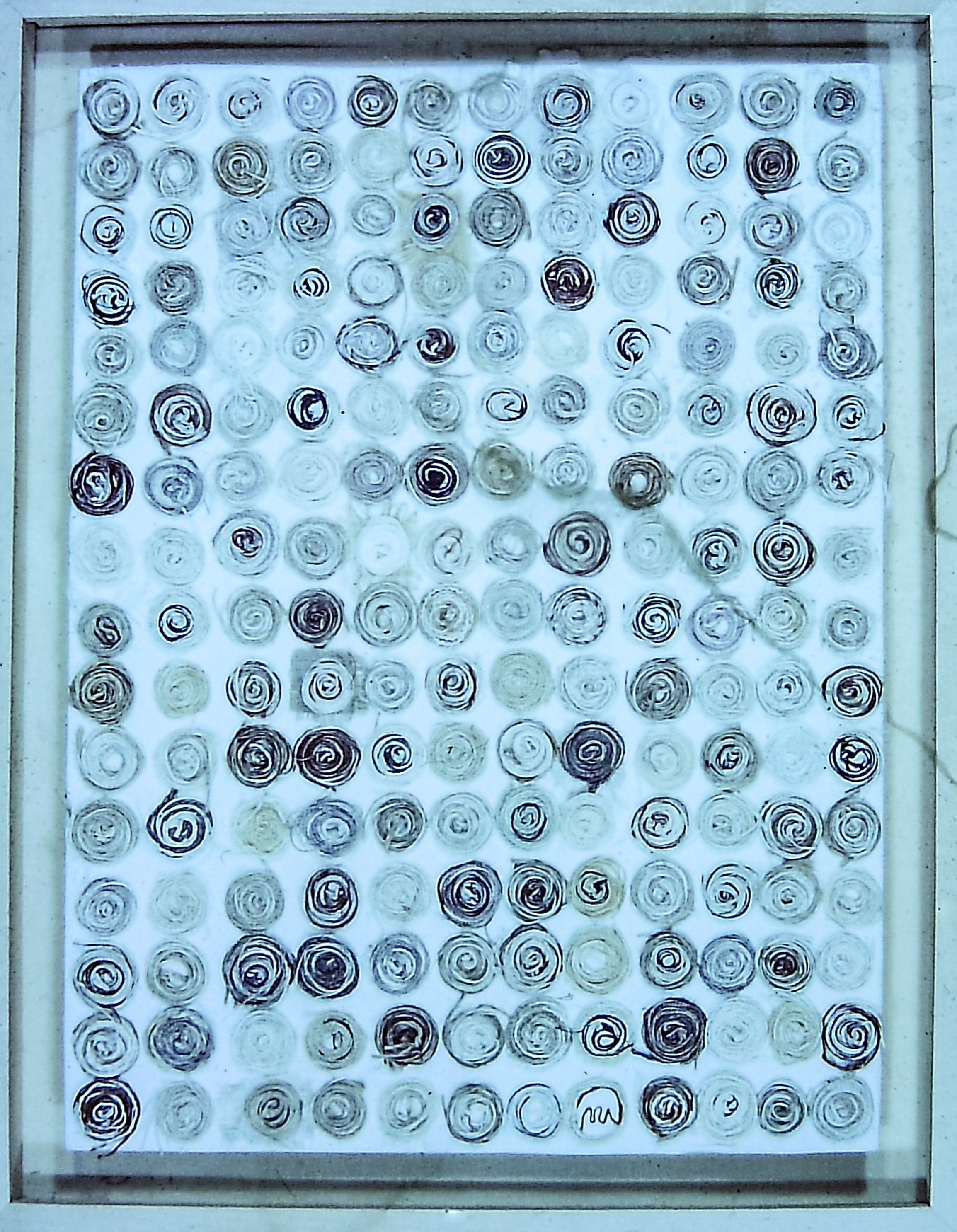 Alt text: collage of wound thread on canvas