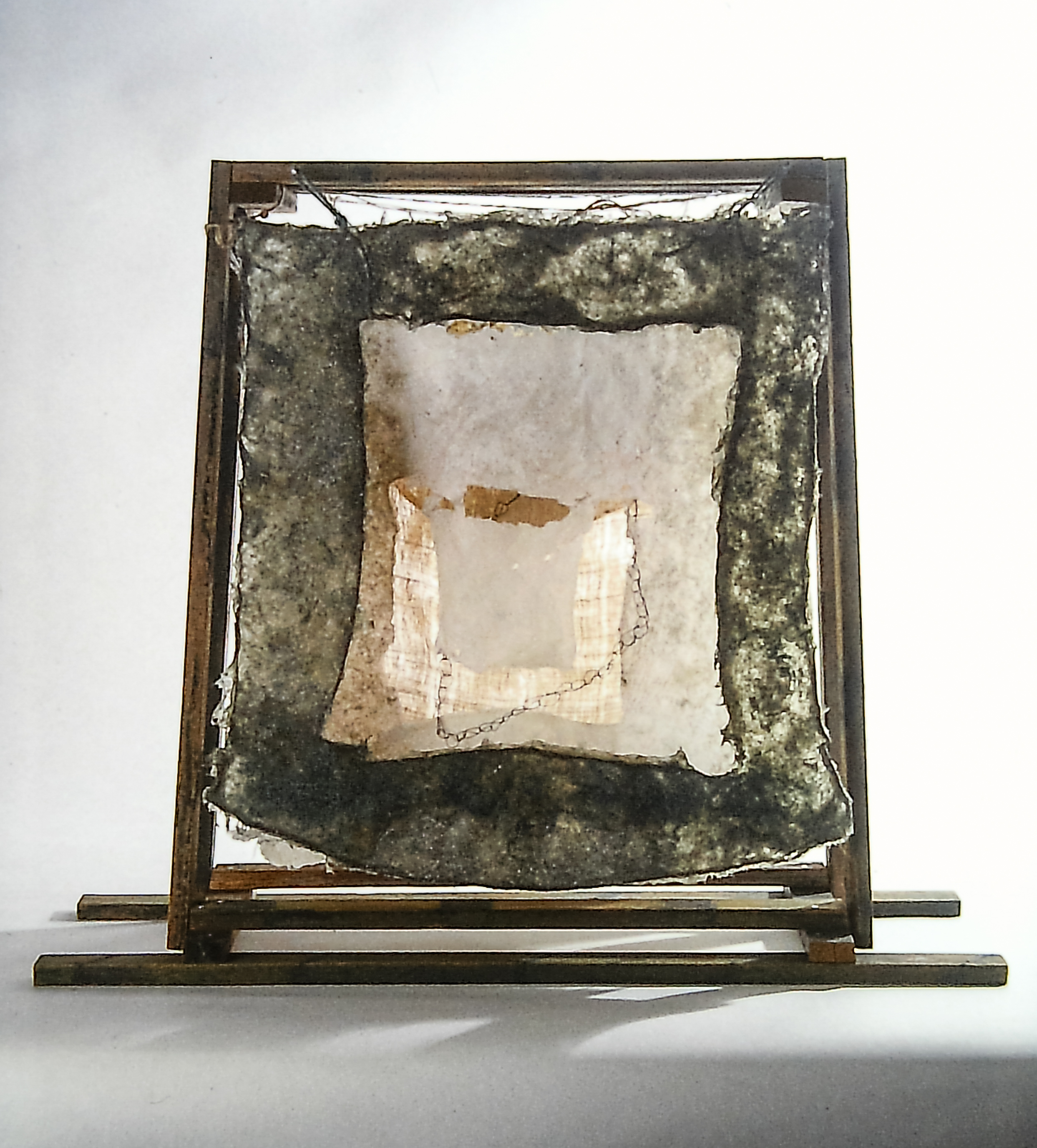 Alt text: wood and flax paper sculpture construction