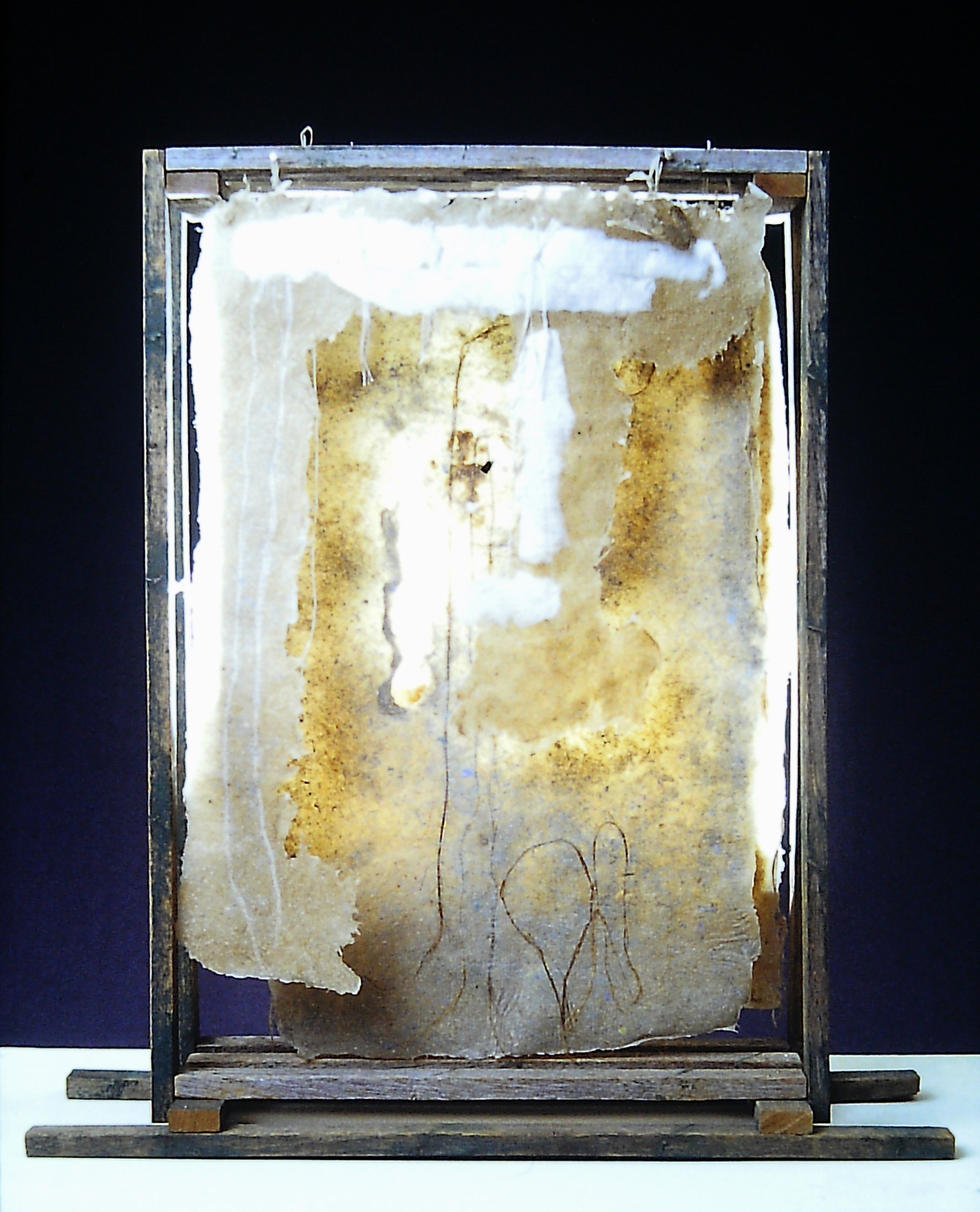 Alt text: wood and flax paper sculpture construction