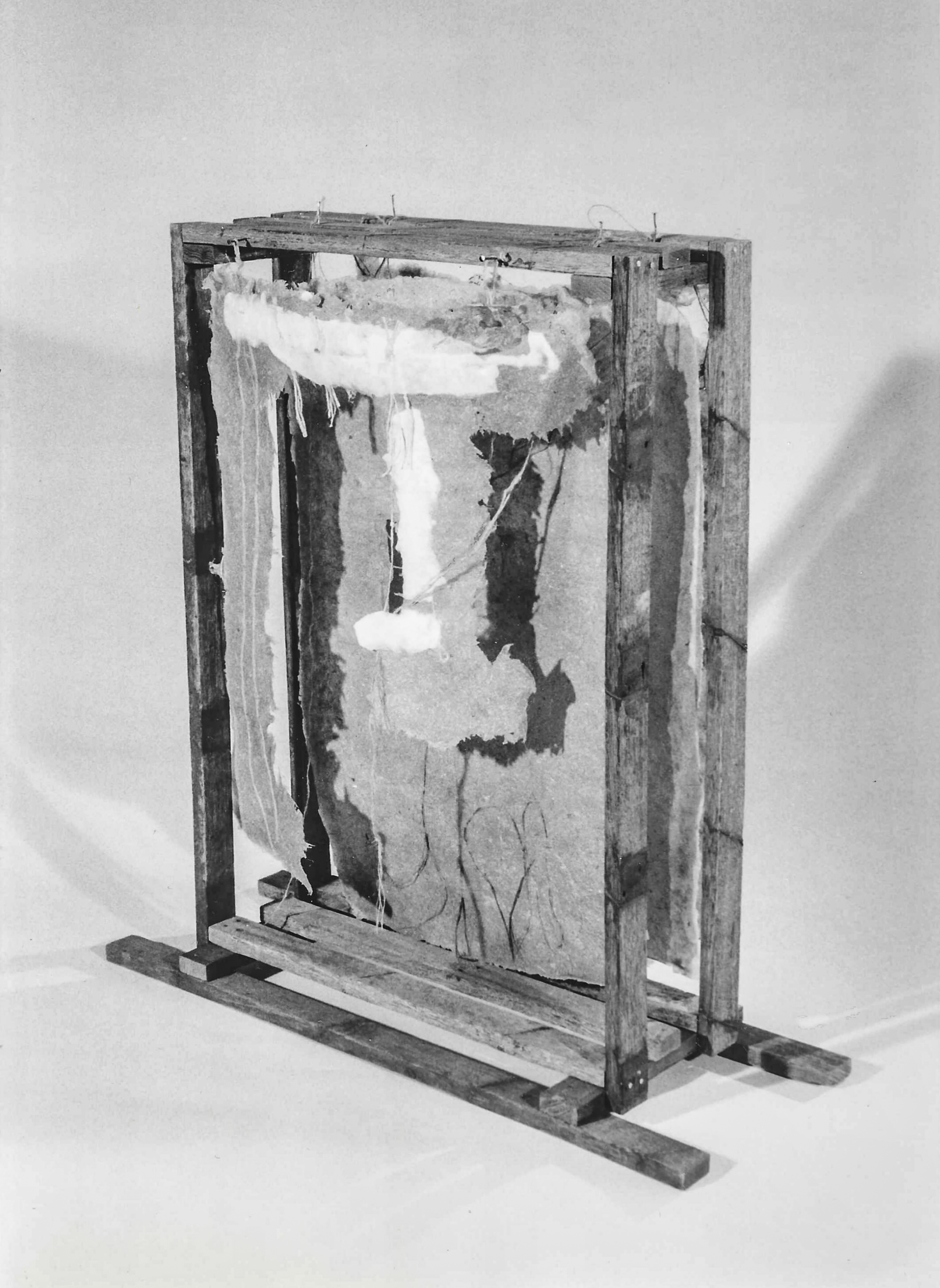 Alt text: wood and flax paper sculpture construction