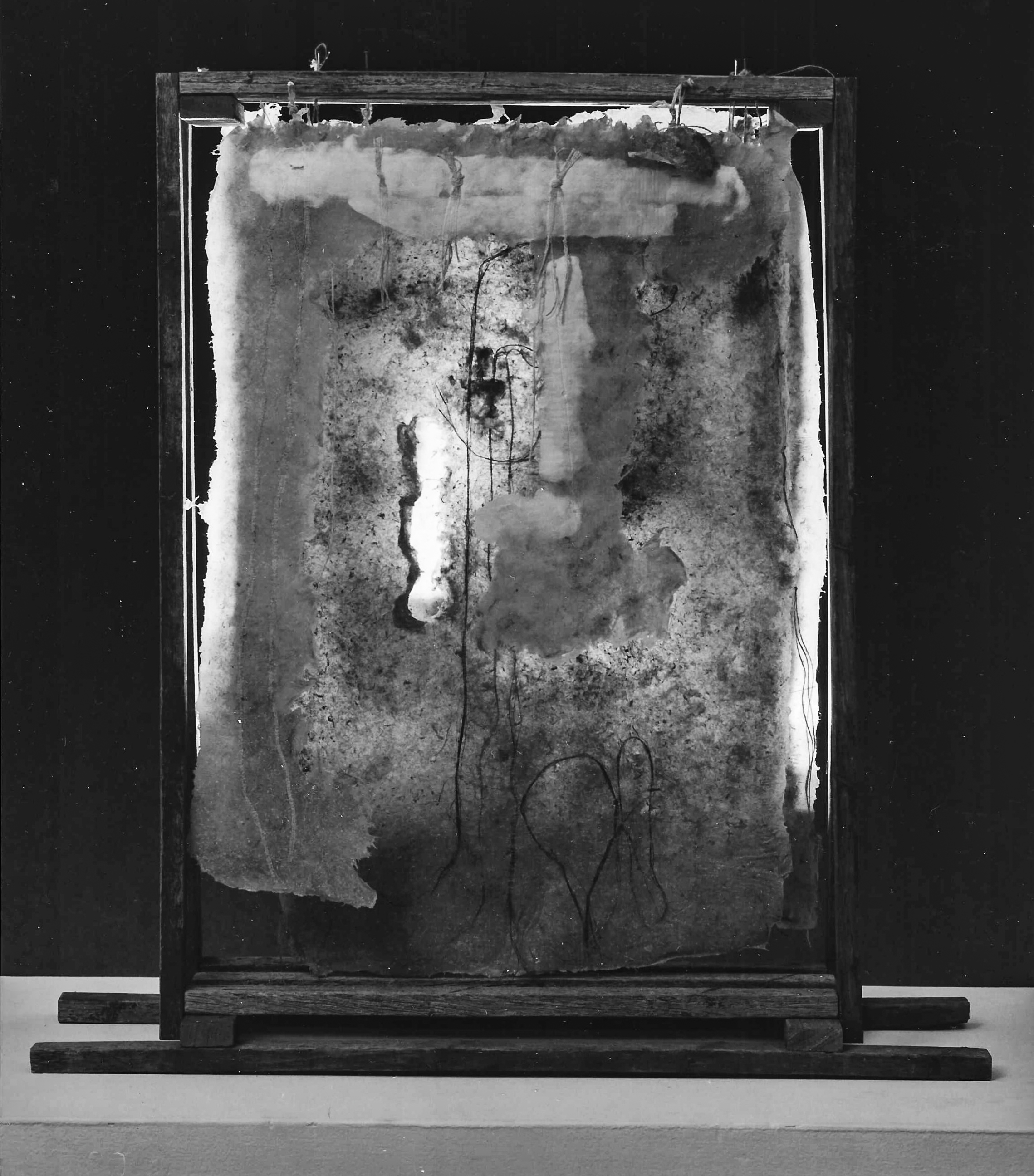 Alt text: wood and flax paper sculpture construction