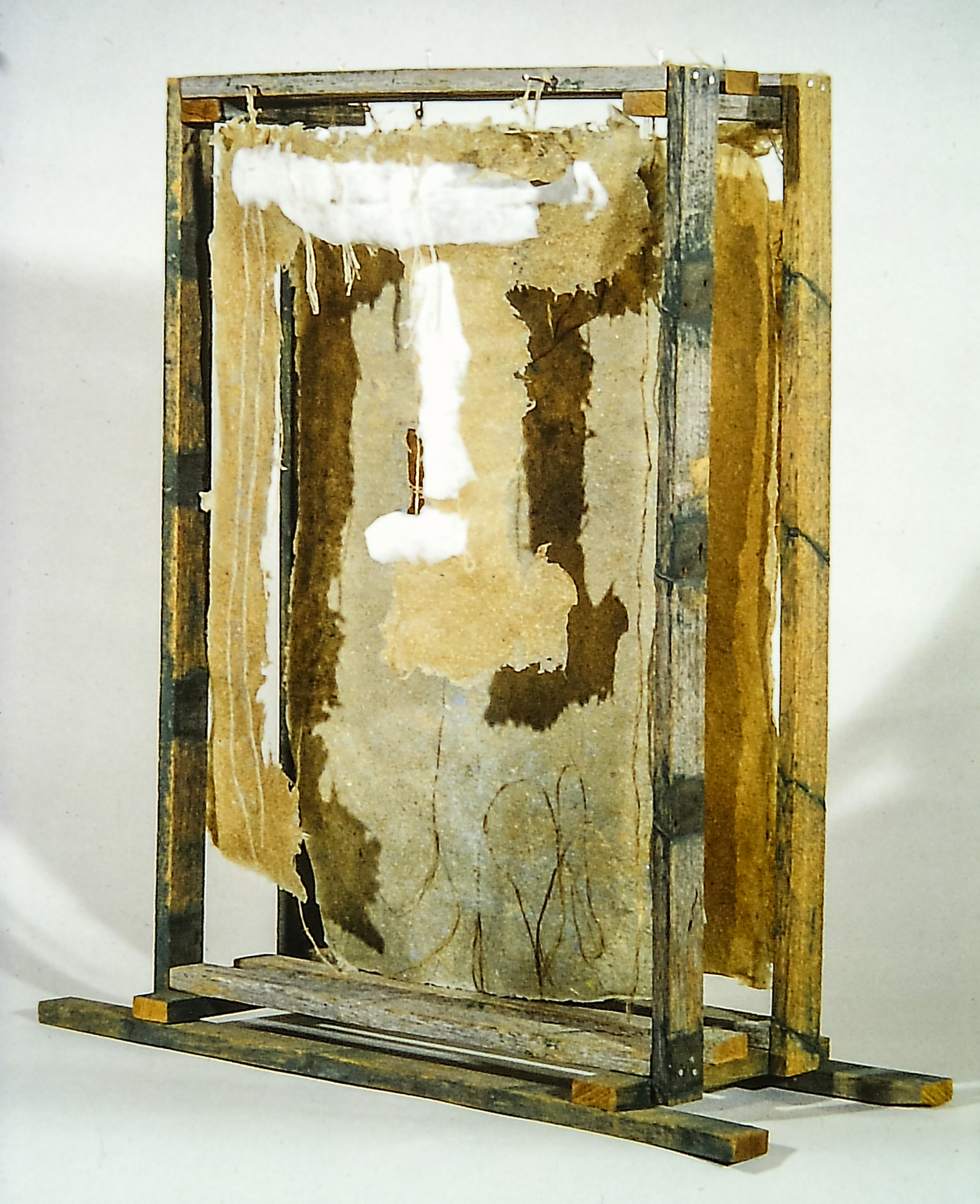 Alt text: wood and flax paper sculpture construction