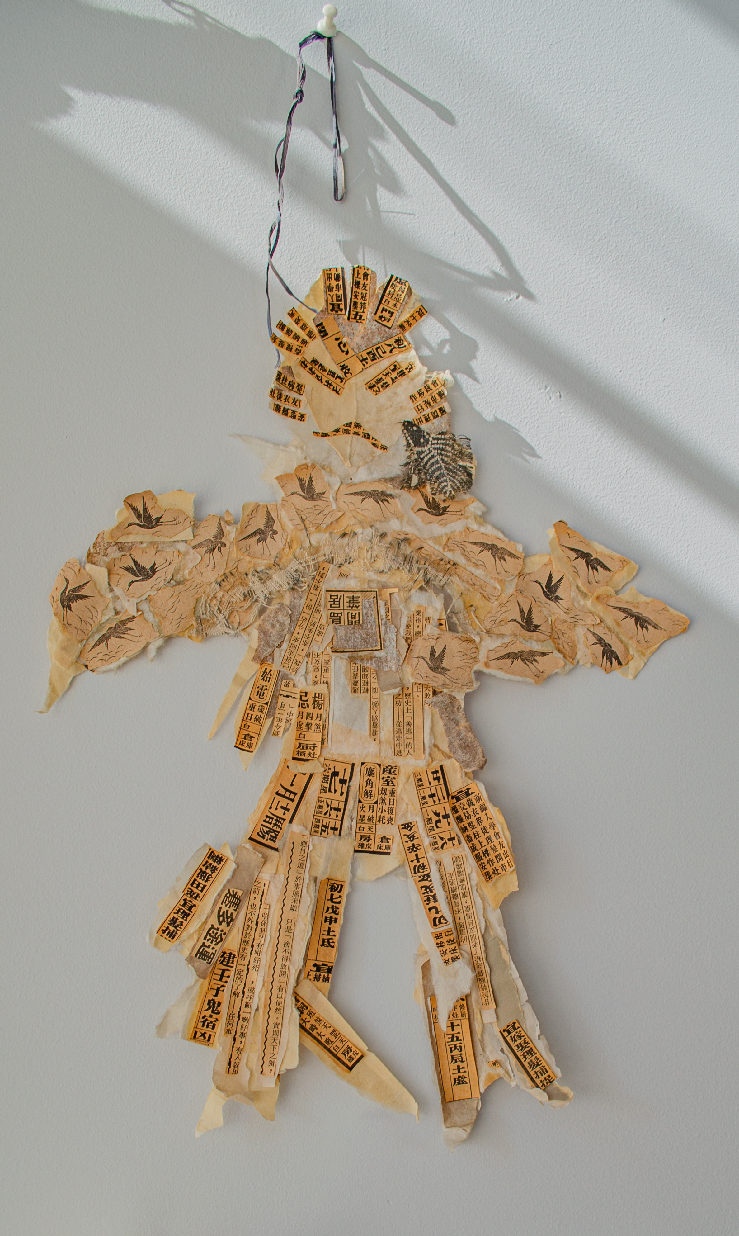 Alt text: Collage of a Samurai with Japanese paper