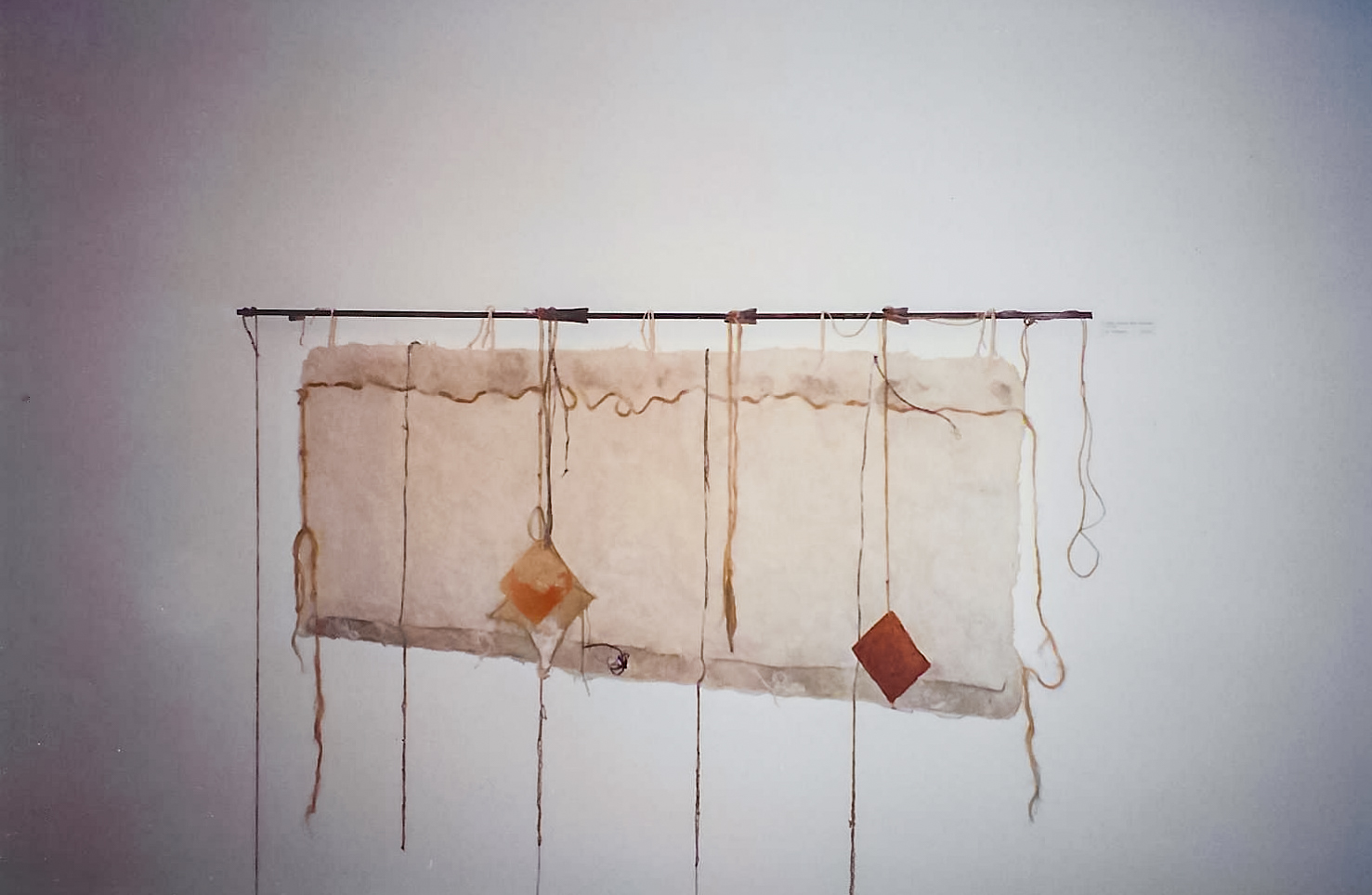 Alt text: Handmade paper wall hanging