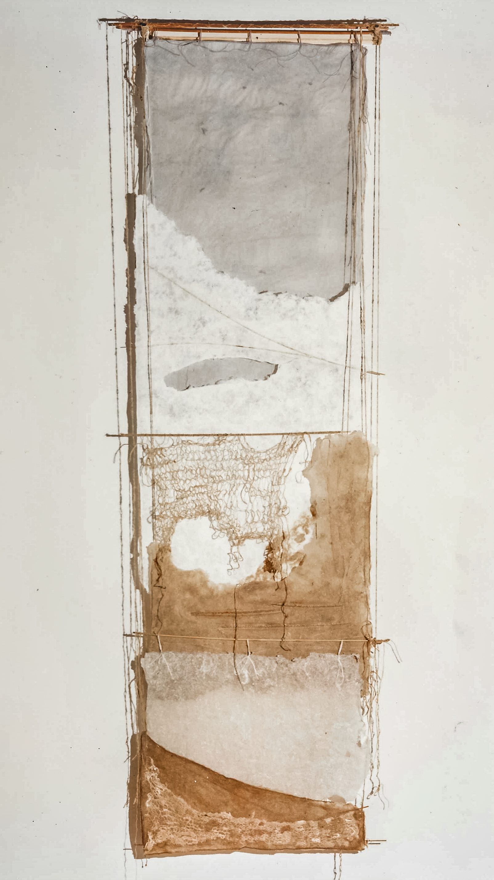 Alt text: Wall hanging of handmade paper