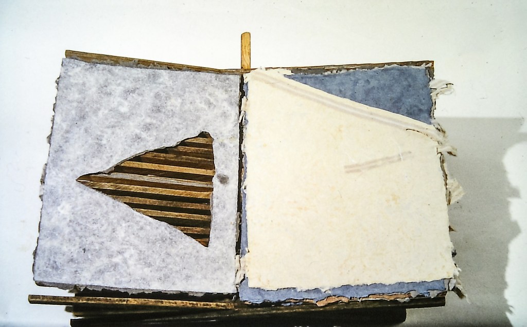 Alt text: A handmade paper book with no words