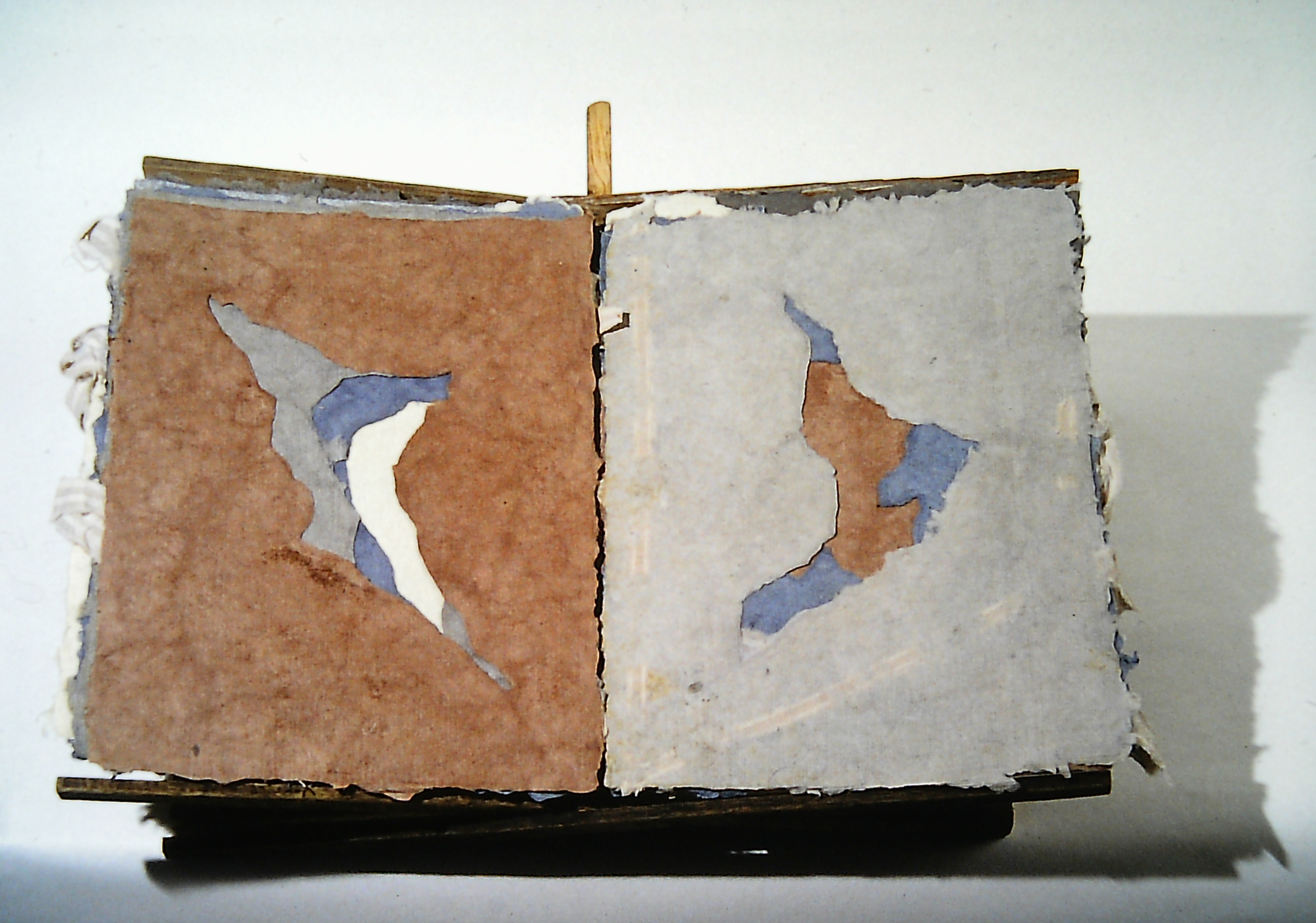 Alt text: A handmade paper book with no words