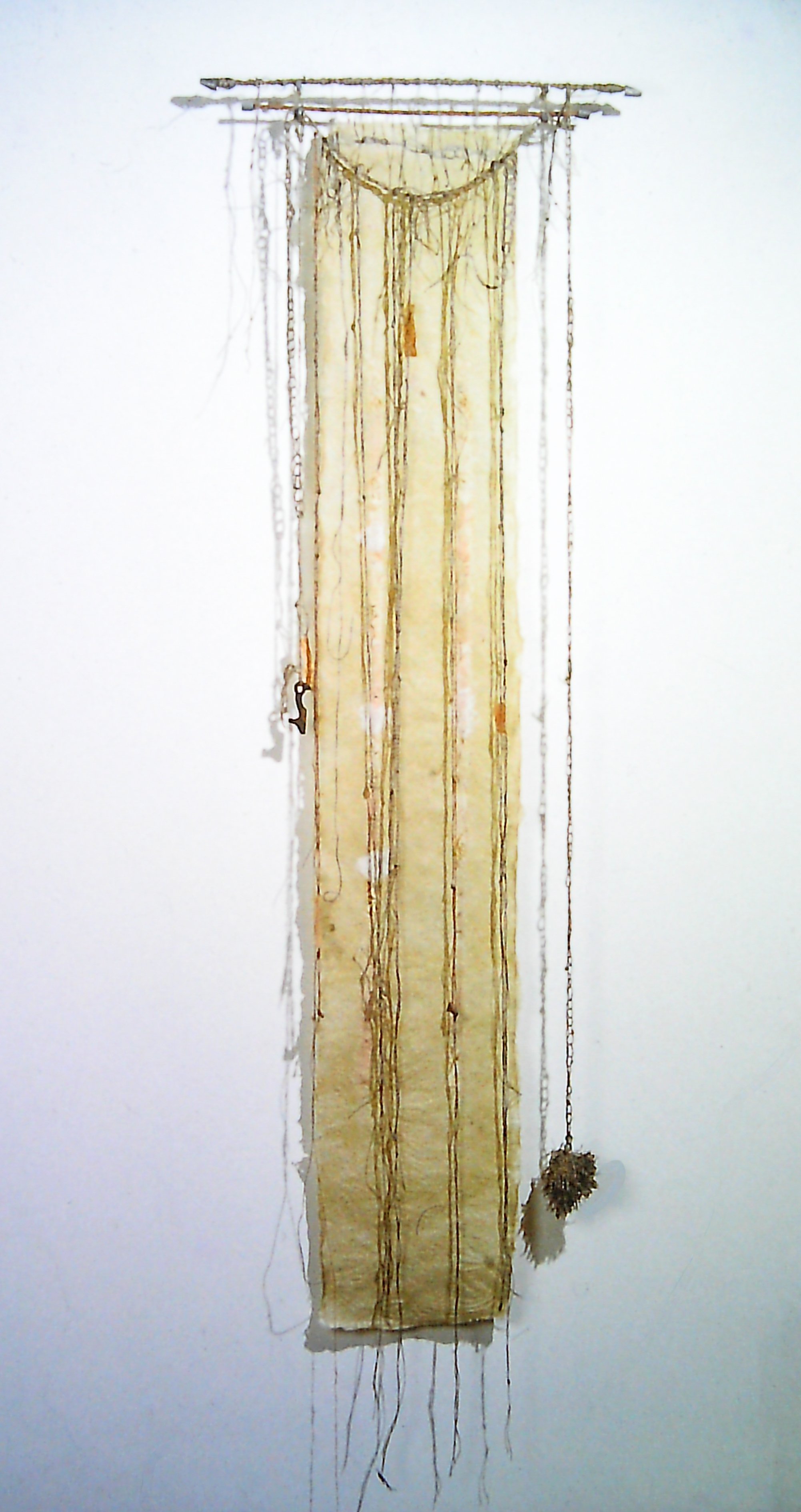 Alt text: Handmade paper wall hanging