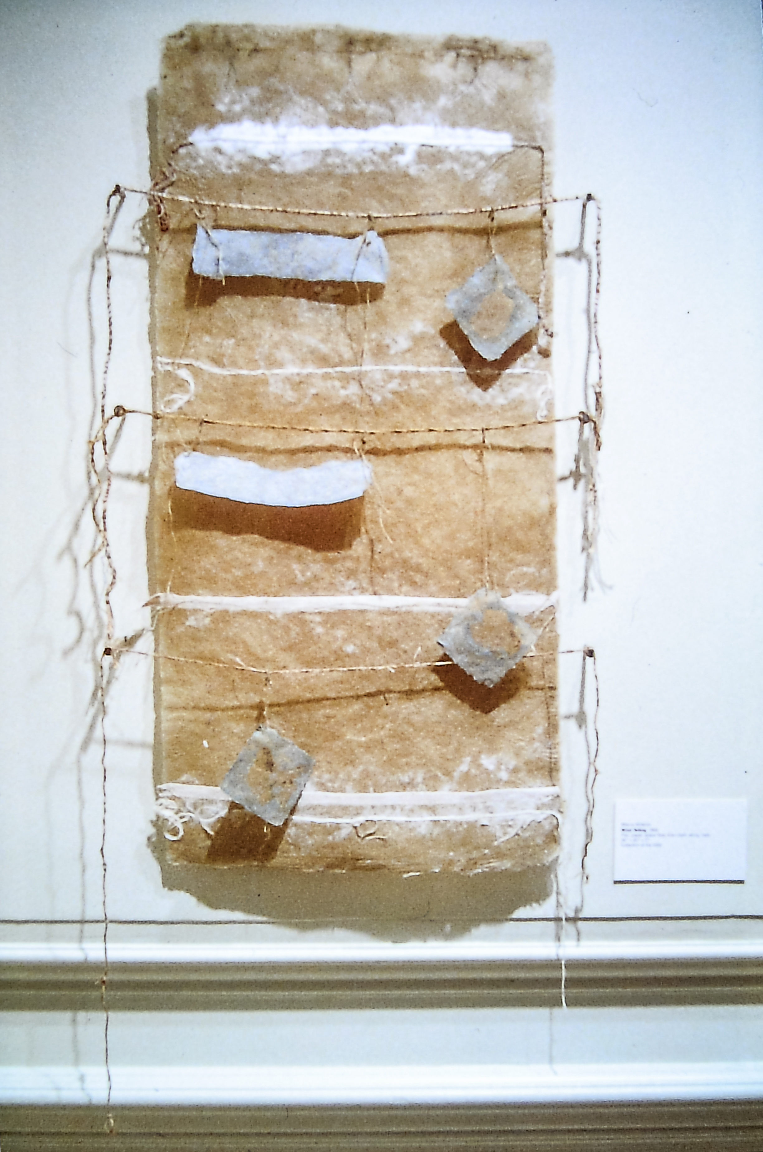 Alt text: Handmade paper wall hanging