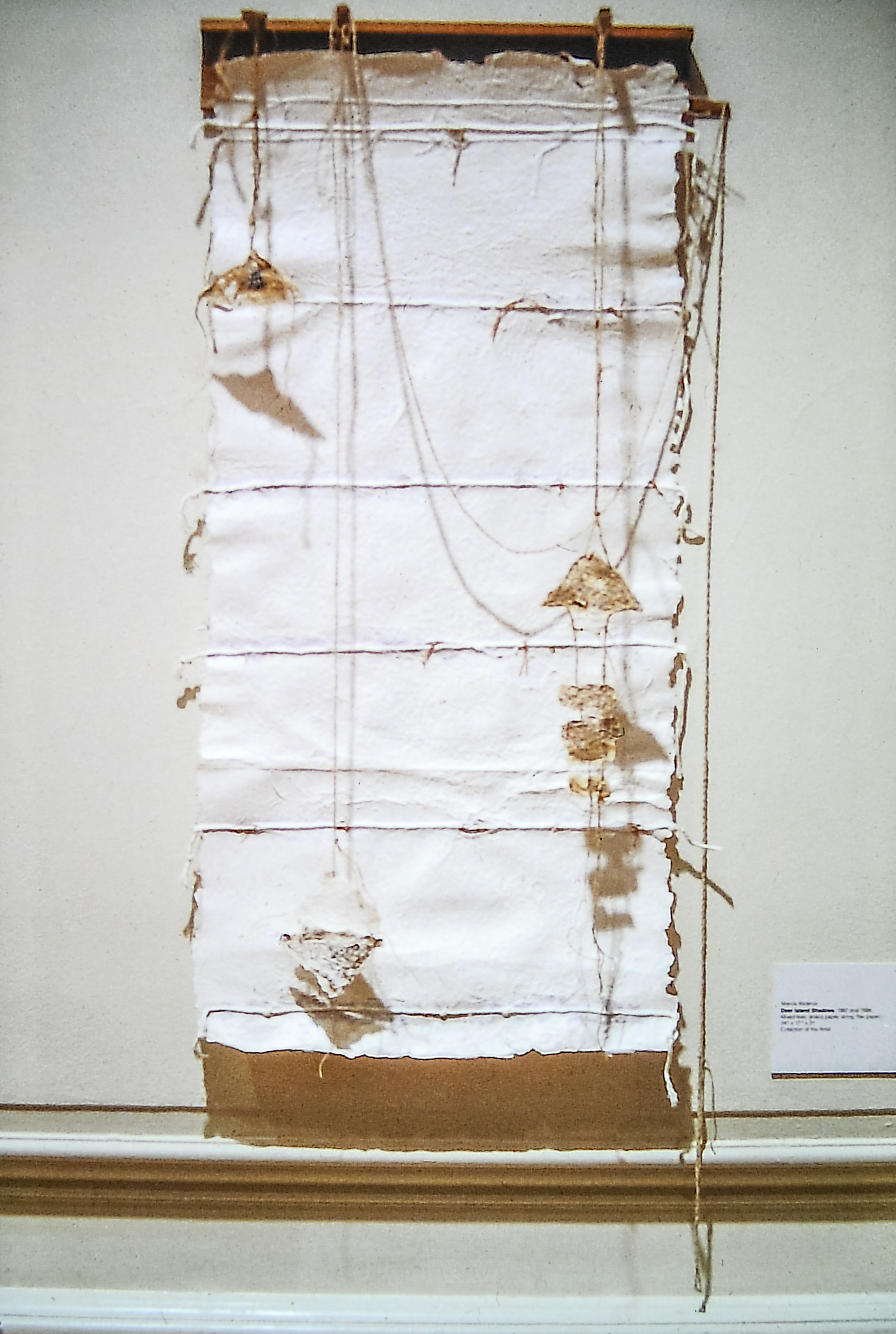 Alt text: Handmade paper wall hanging