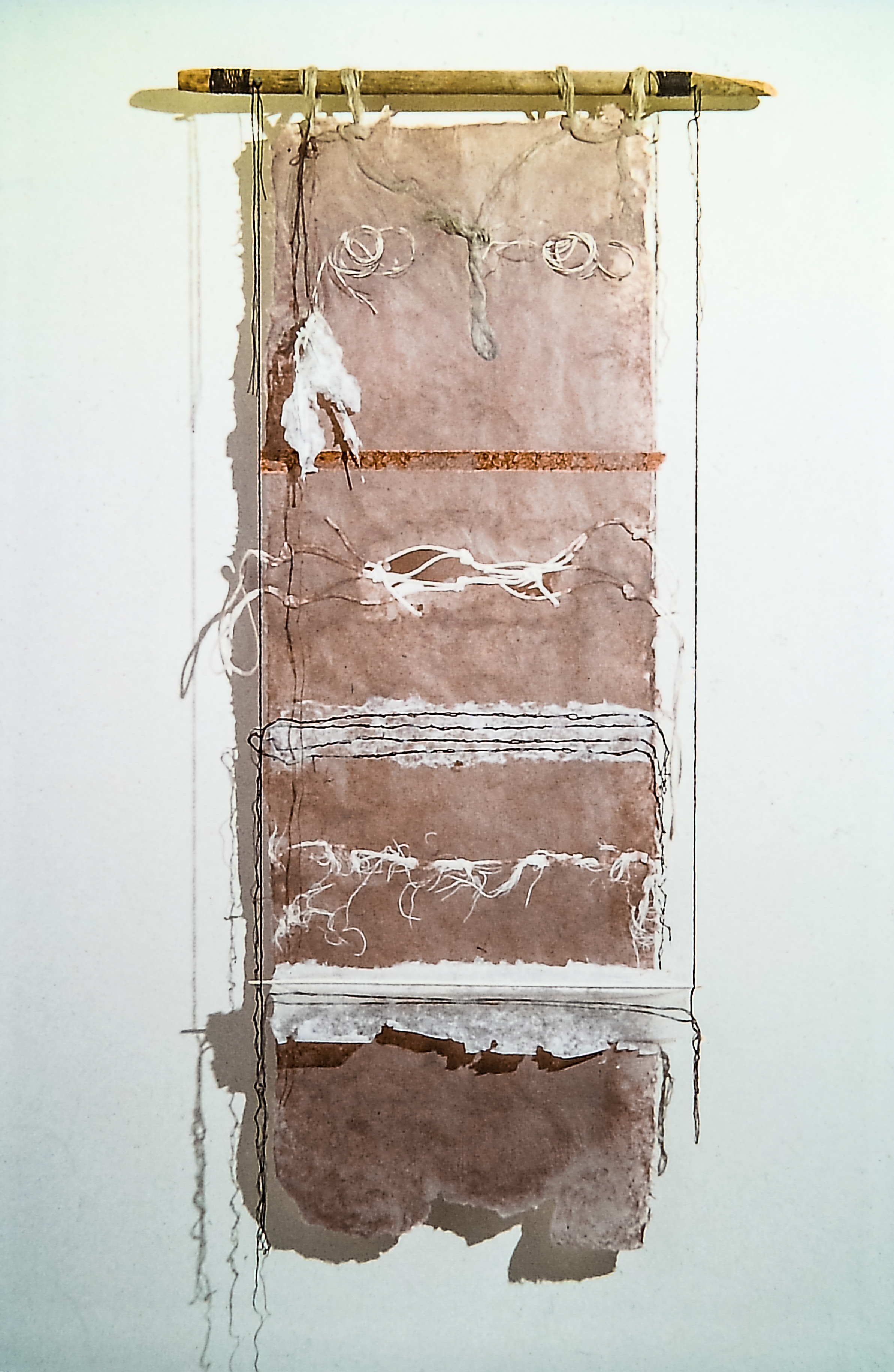 Alt text: Handmade paper wall hanging