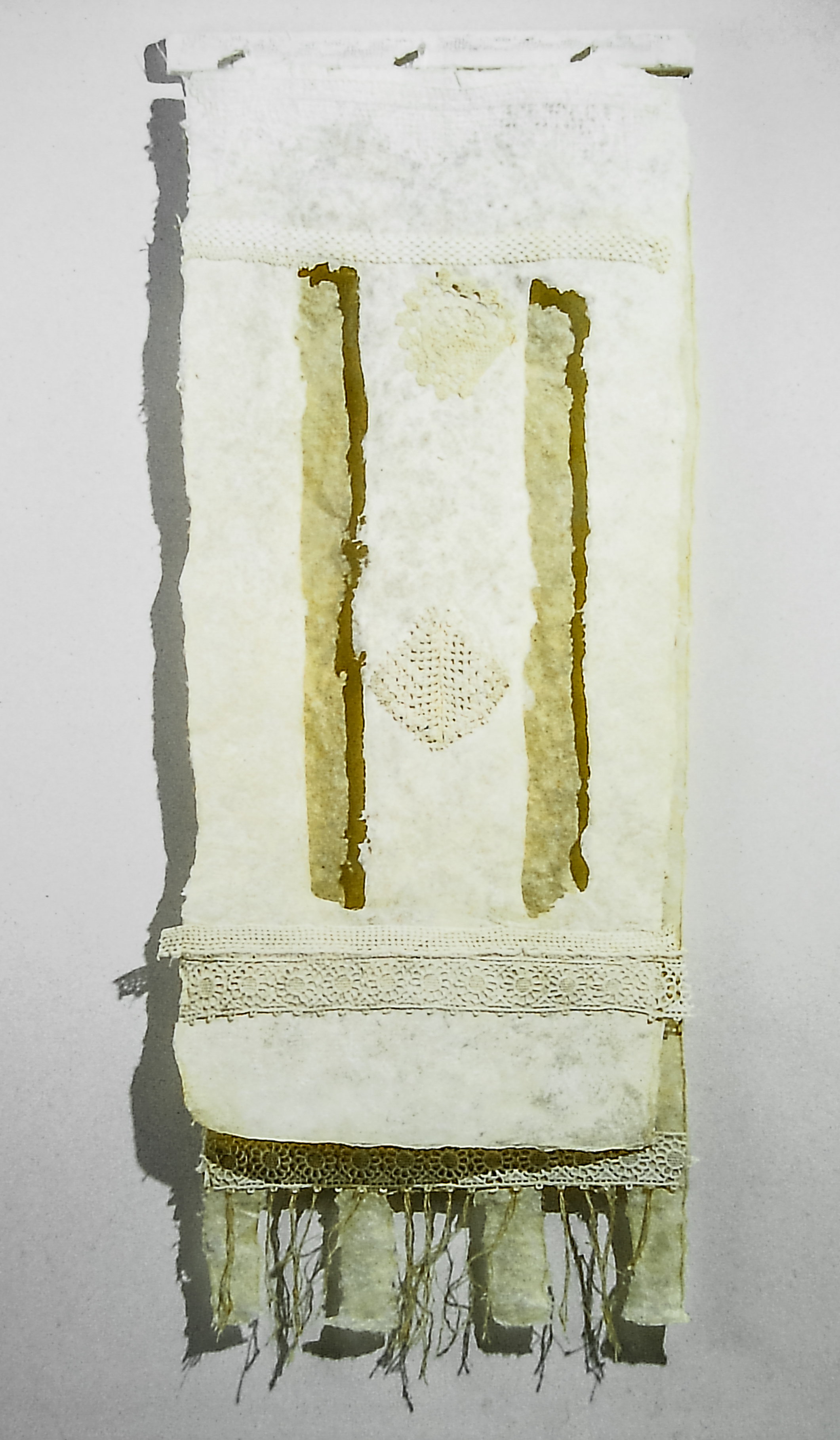 Alt text: Handmade paper wall hanging